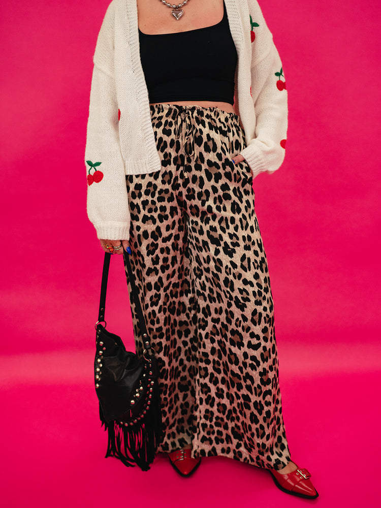 RUNNING WILD LEOPARD PRINT PANTS