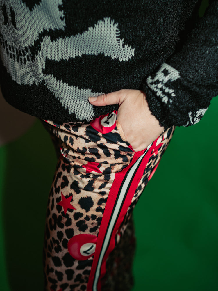 UNTAMED ENERGY LEOPARD WIDE LEG PANTS
