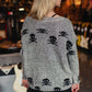 FADE TO BLACK SKULL SWEATER
